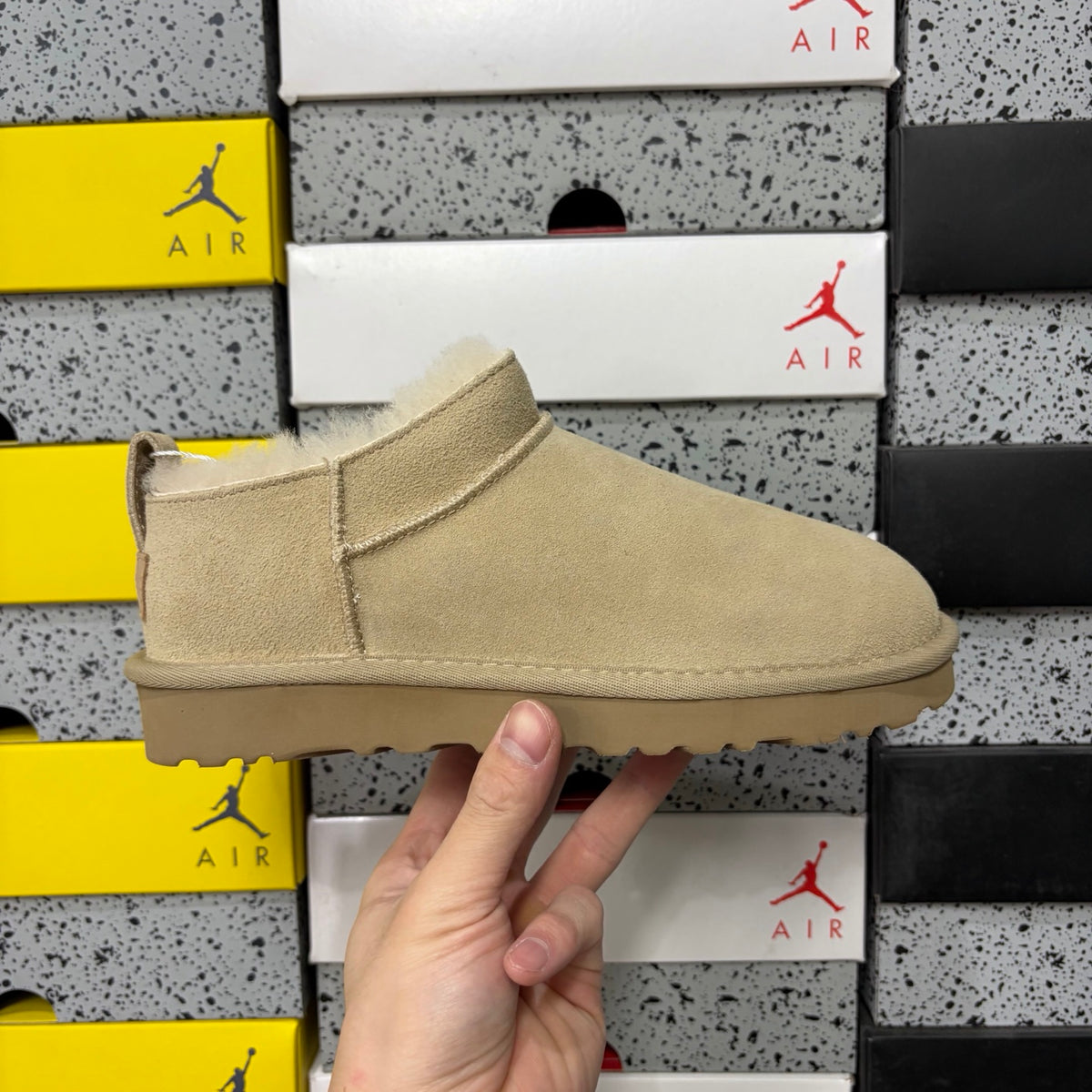 UGG Fluffy-Lined Slip-On Shoes in Sand