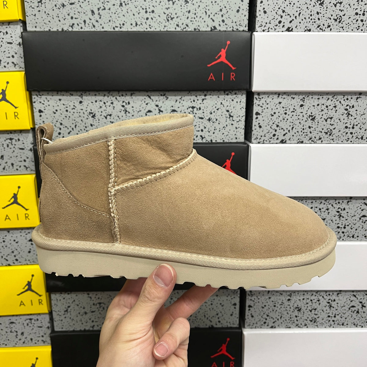 UGG Mini Pull-On Ankle Boots in Sand