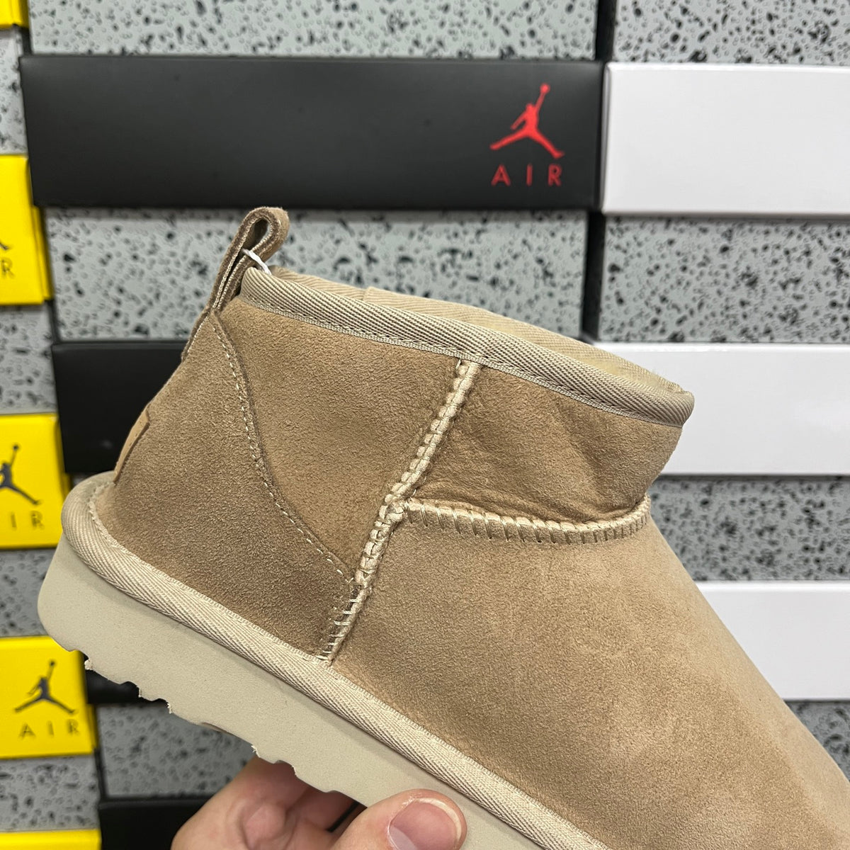 UGG Mini Pull-On Ankle Boots in Sand