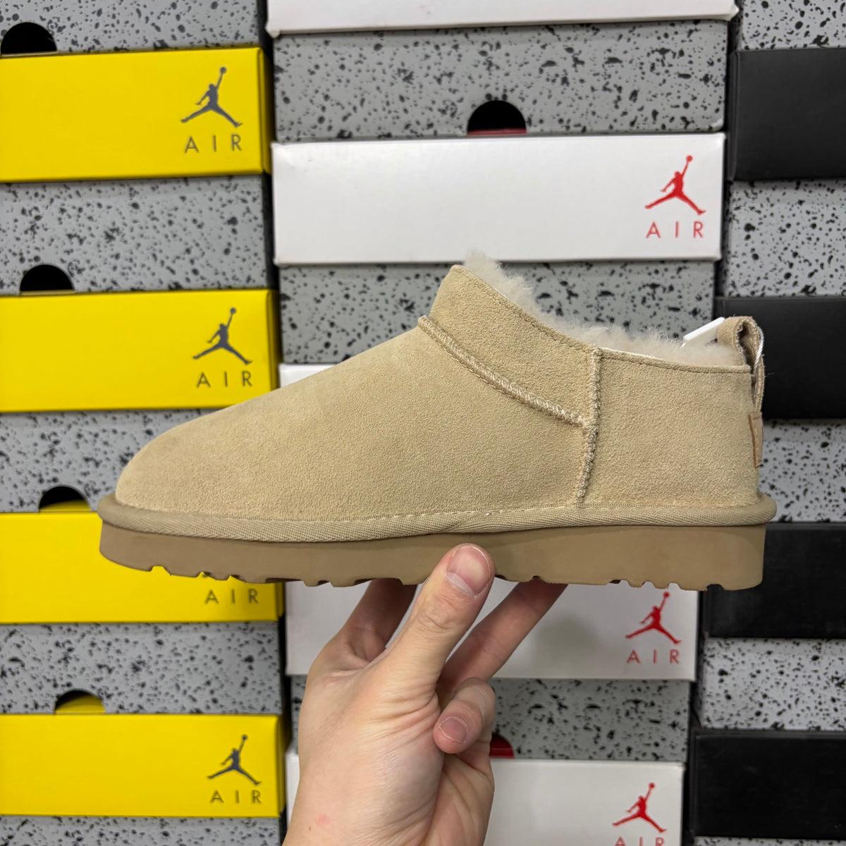UGG Fluffy-Lined Slip-On Shoes in Sand