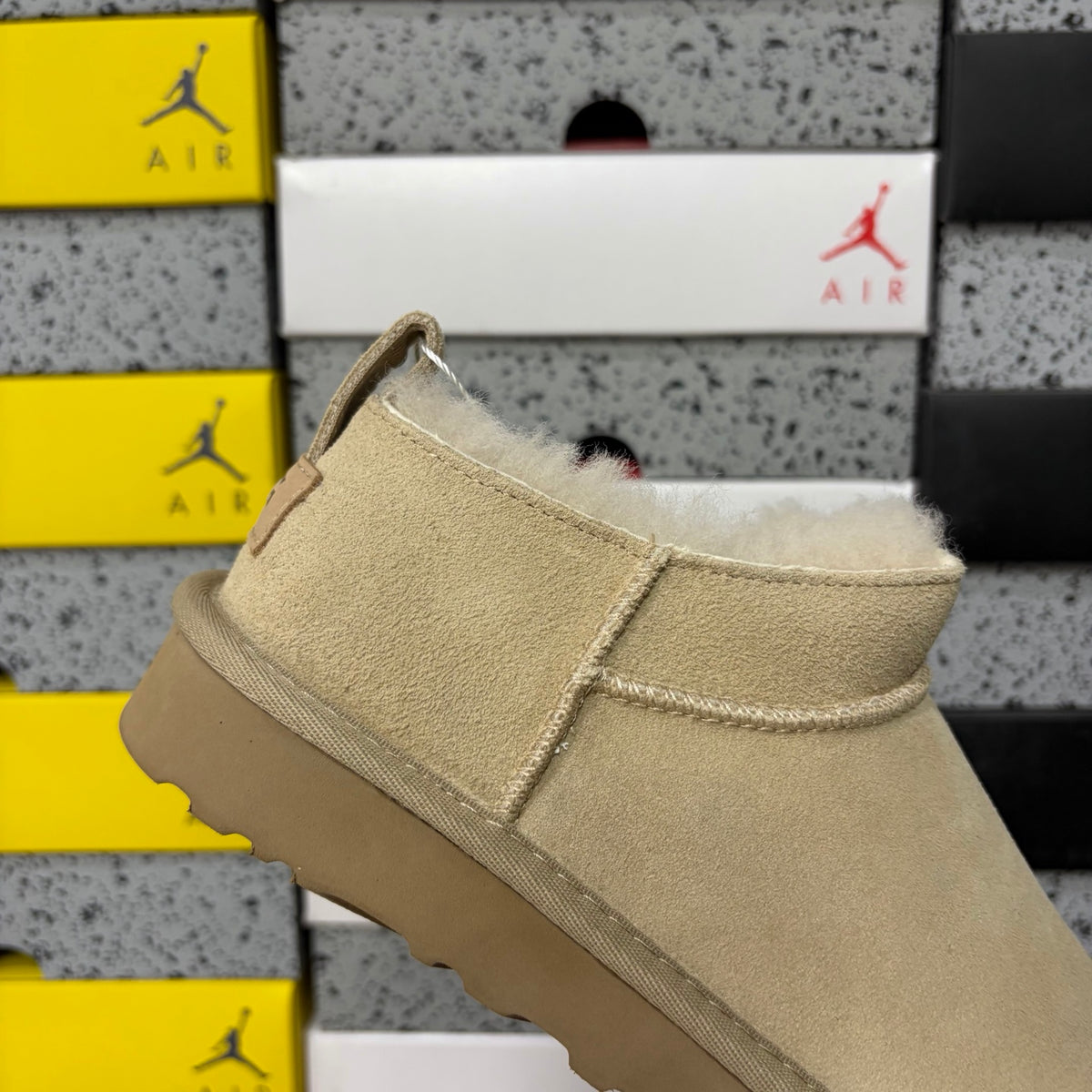 UGG Fluffy-Lined Slip-On Shoes in Sand