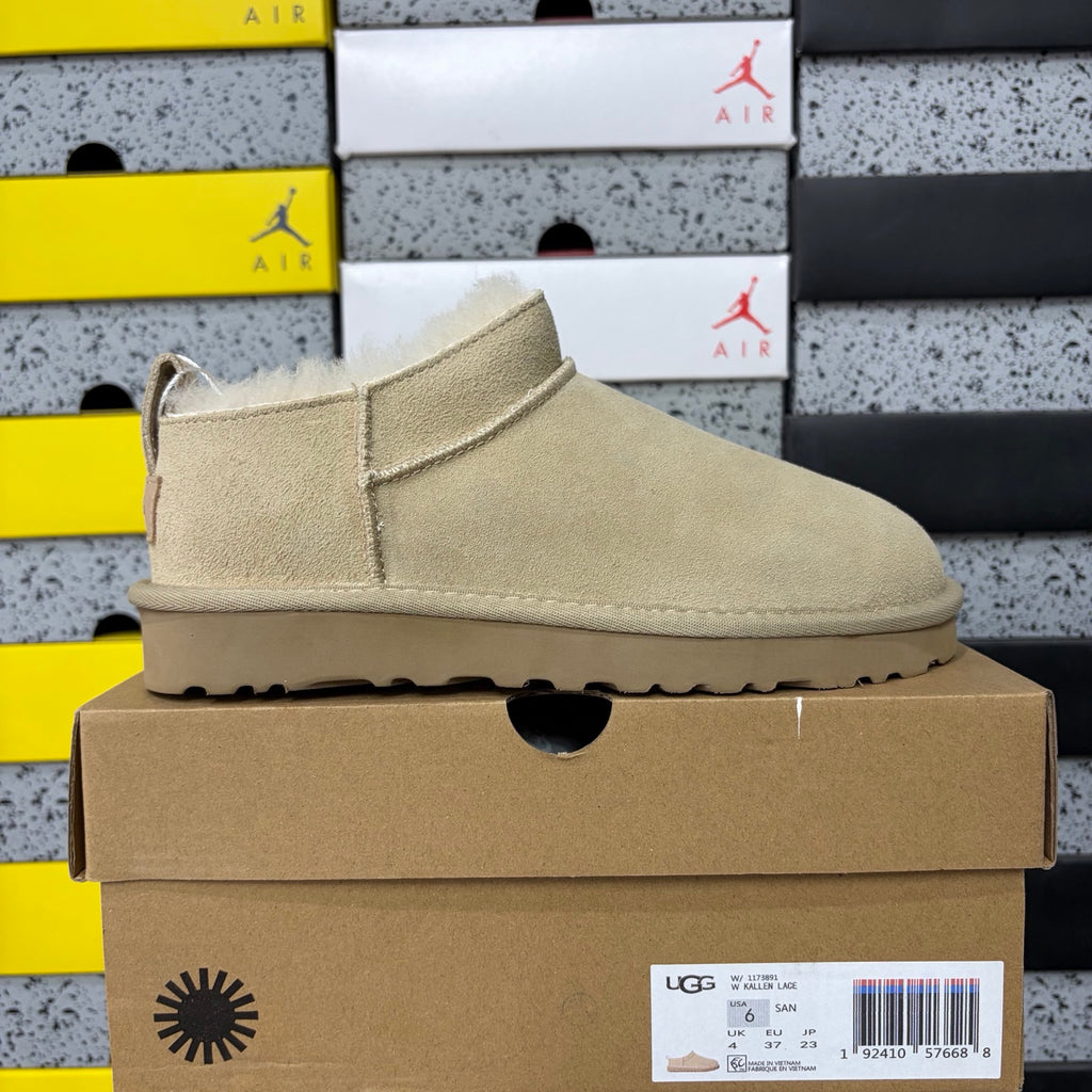 UGG Fluffy-Lined Slip-On Shoes in Sand