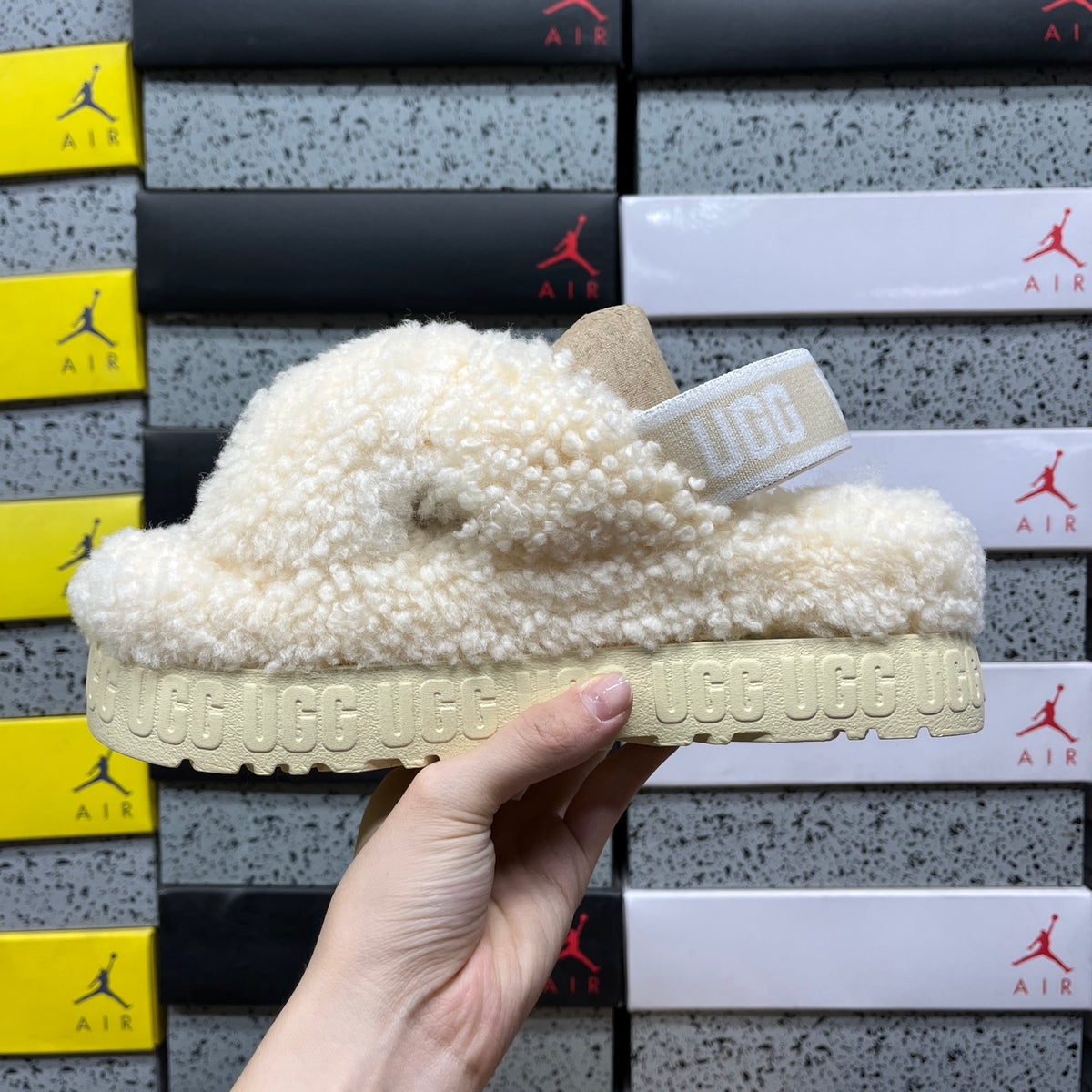 UGG Fluffy Cross-Strap Platform Sandals in Cream