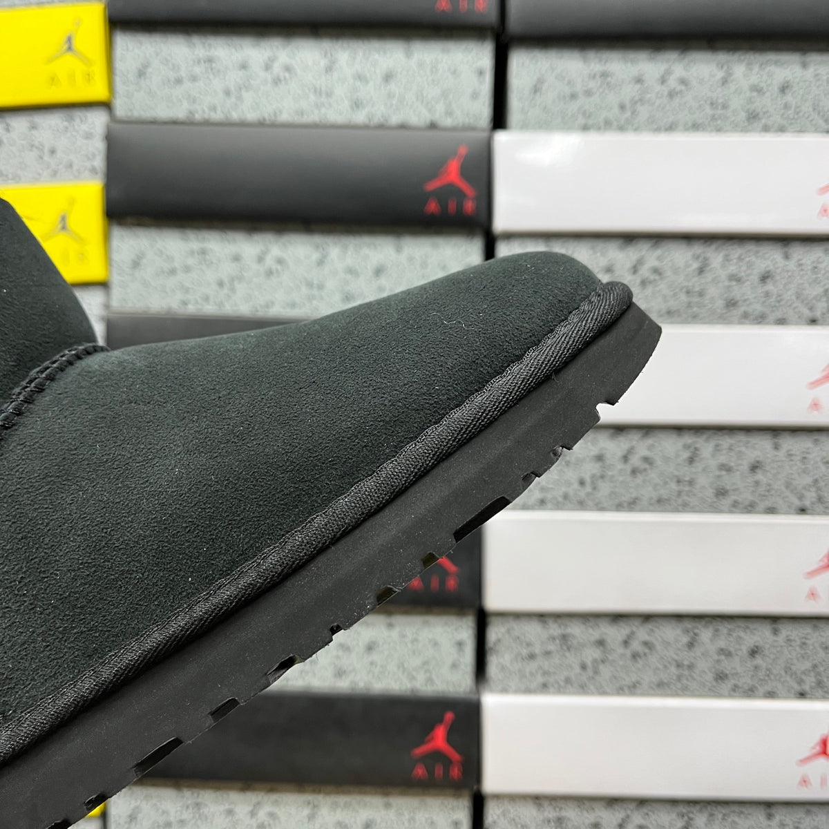 UGG Mini Button Ankle Boots in Black