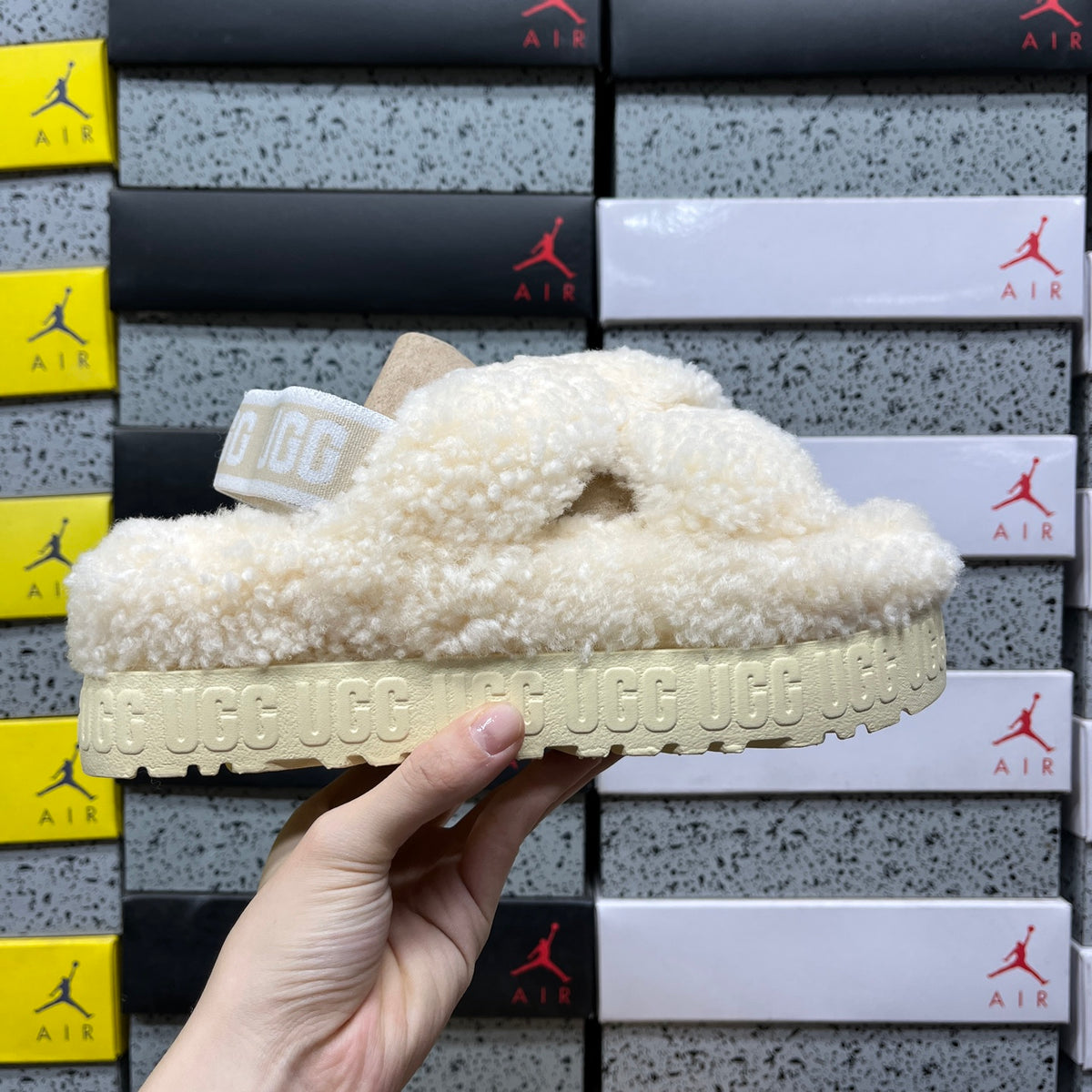 UGG Fluffy Cross-Strap Platform Sandals in Cream