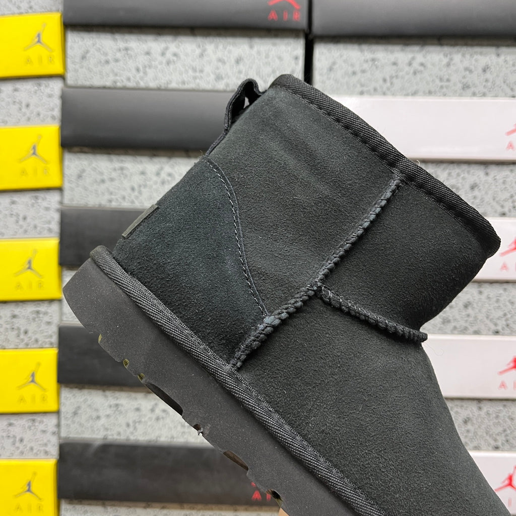 UGG Mini Pull-On Ankle Boots in Black